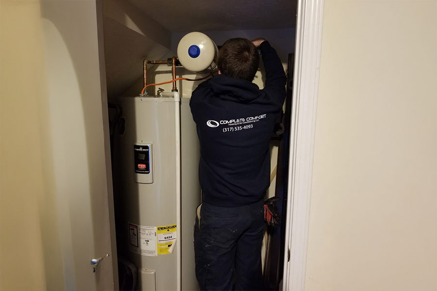 Technician Performing Water Heater Service