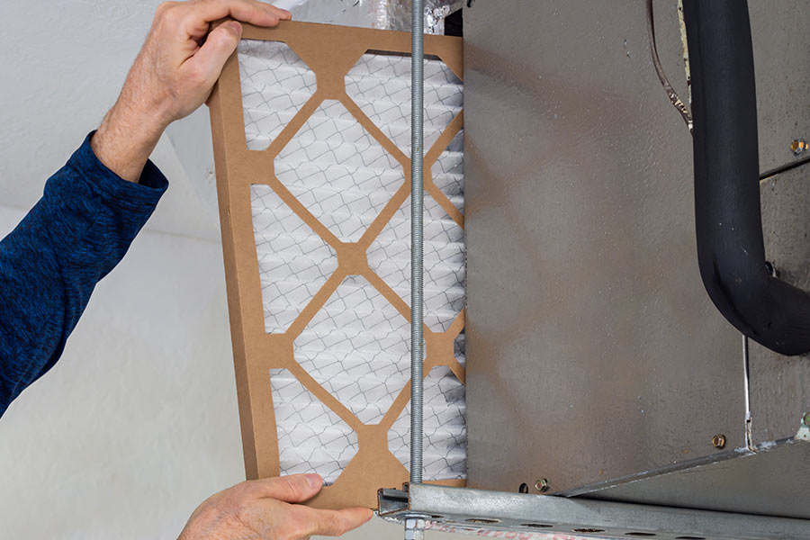 Inserting a clean air filter in HVAC