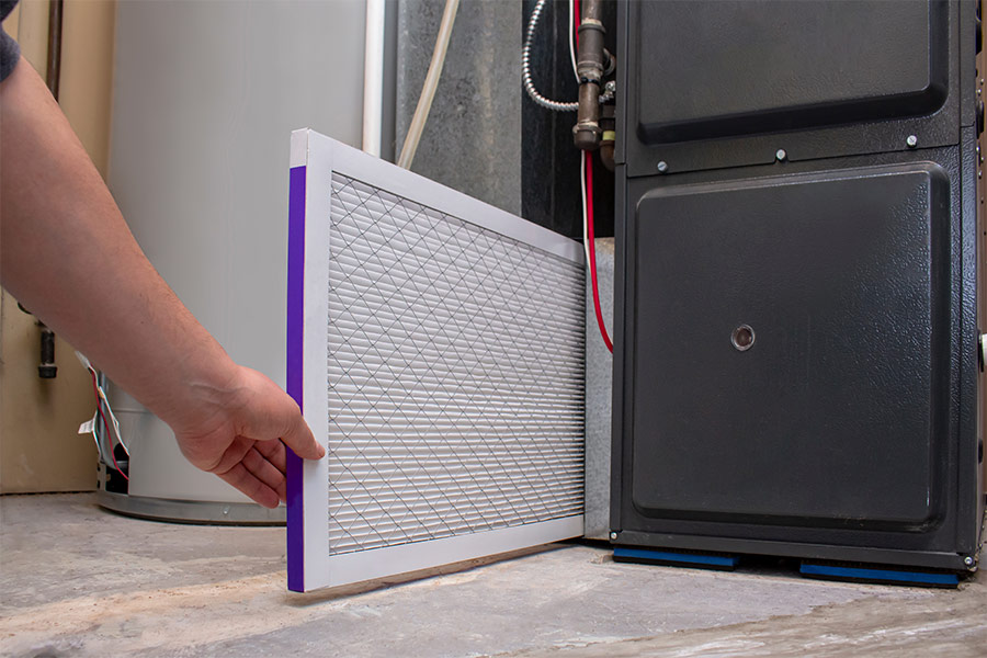 Replacing an air filter in a furnace