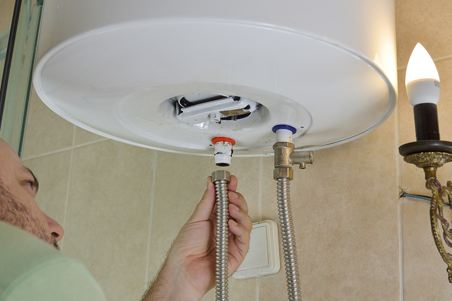 Water heater repair in progress in Bloomfield, IN